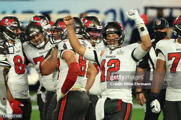 Tom Brady of the Tampa Bay Buccaneers reacts with teammates late in the fourth quarter against the Kansas City Chiefs in Super Bowl LV at Raymond...