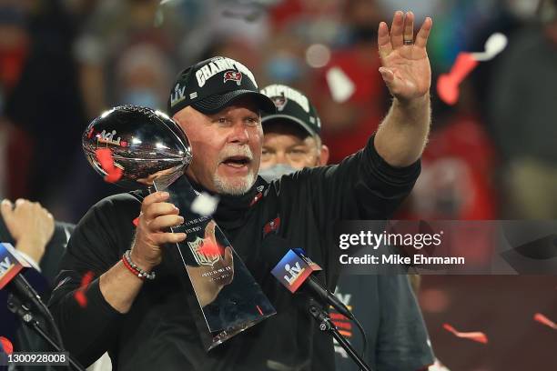 Head coach Bruce Arians of the Tampa Bay Buccaneers lifts the Lombardi Trophy after defeating the Kansas City Chiefs in Super Bowl LV at Raymond...