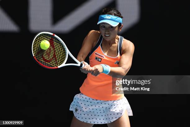 Misaki Doi of Japan plays a backhand in her Women's Singles first round match against Ajla Tomljanovic of Australia during day one of the 2021...