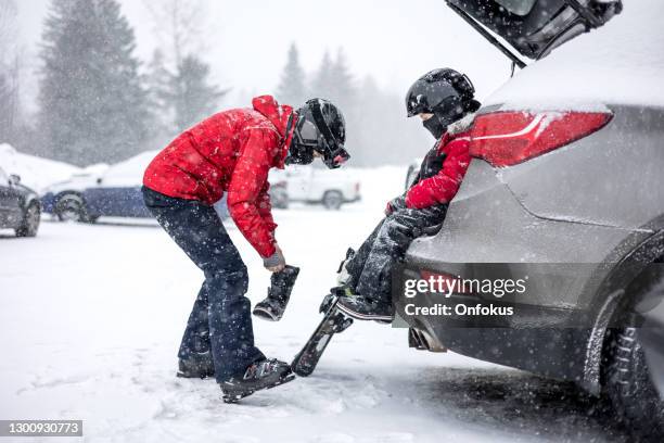 mother and son preparing for ski during covid-19 pandemic - car mountain stock pictures, royalty-free photos & images