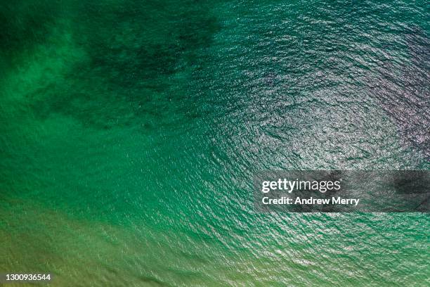 calm green sea, wave pattern, aerial view, close up - calm water stock pictures, royalty-free photos & images