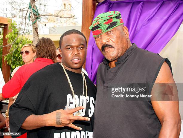 Smitty and Jim Brown during 2005 MTV VMA - John Singelton Party Hosted by DJ Biz Markie and Snoop Dogg at Sanctuary Hotel in Miami, Florida, United...