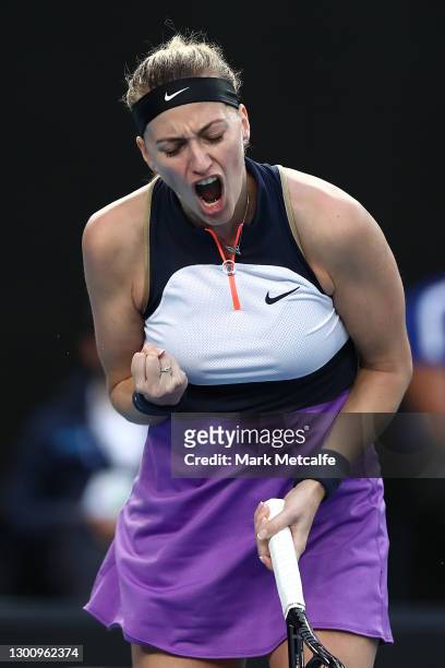 Petra Kvitova of the Czech Republic celebrates winning a point in her Women's Singles first round match against Greet Minnen of Belgium during day...