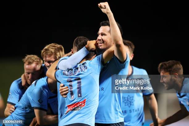Kosta Barbarouses of Sydney FC celebrates with Ryan McGowan of Sydney FC and their team after scoring a goal during the A-League match between Sydney...