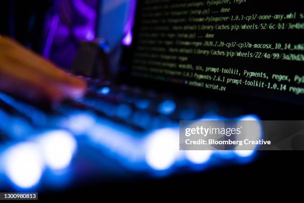data and text on computer screens - confidential engels woord stockfoto's en -beelden