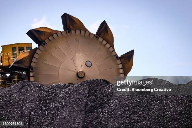 coal excavator at a working coal mine - coal mine bildbanksfoton och bilder