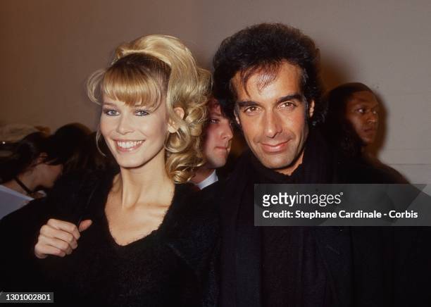 David Copperfield and Claudia Schiffer attend the Herve Leger Ready to Wear AW 1994-95 show as part of Paris Fashion Week on March 09, 1994 in Paris,...