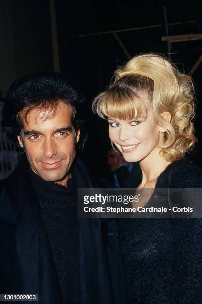 David Copperfield and Claudia Schiffer attend the Herve Leger Ready to Wear AW 1994-95 show as part of Paris Fashion Week on March 09, 1994 in Paris,...