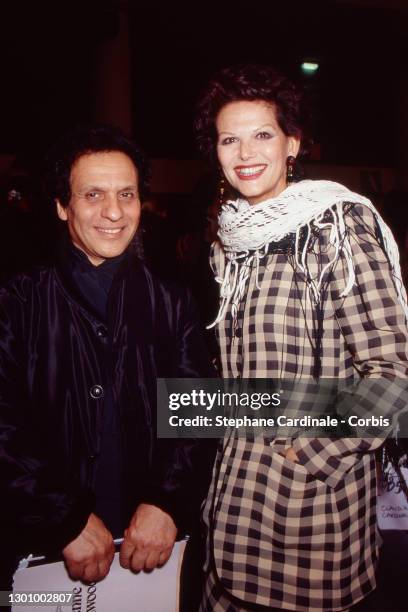 Fashion desgner Azzedine Alaia and Actress Claudia Cardinale attend the Vivienne Westwood Ready to Wear AW 1994-95 show as part of Paris Fashion Week...