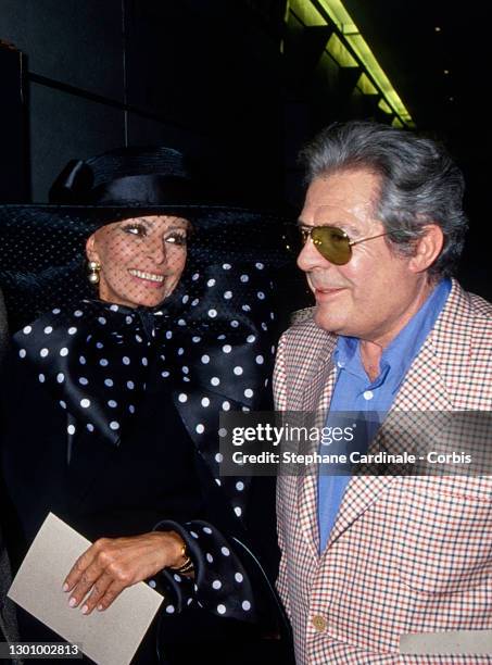 Actress Sophia Loren and actor Marcelo Mastroianni attend the shooting of the movie « Pret-à-porter » by Robert Altman during the Ready to Wear AW...