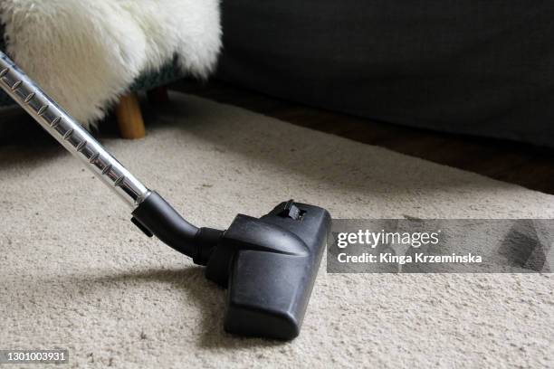 vacuum cleaner - maid hoovering stock pictures, royalty-free photos & images