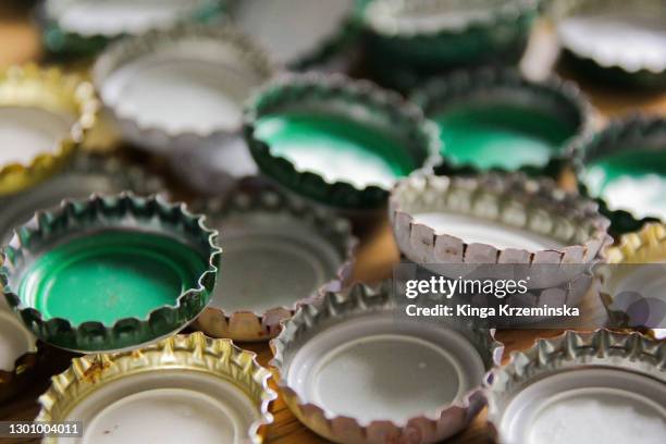 bottle caps - beer cap stock pictures, royalty-free photos & images