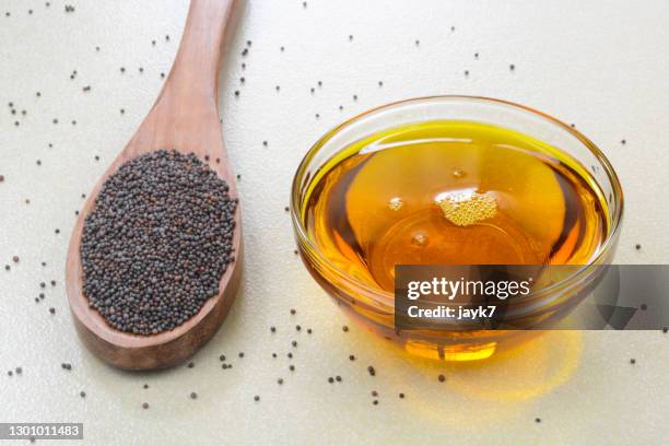 mustard seed oil - mustard plant stock pictures, royalty-free photos & images