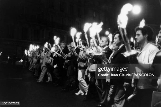 Marche aux flambeaux organisée par le 'Syndicat National de la Petite et Moyenne Entreprise' pour lancer un avertissement au gouvernemet et composée...