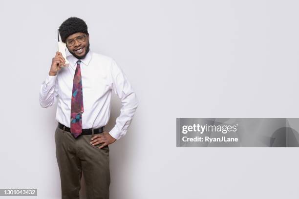 retro office worker on classic brick phone - 1980 office stock pictures, royalty-free photos & images