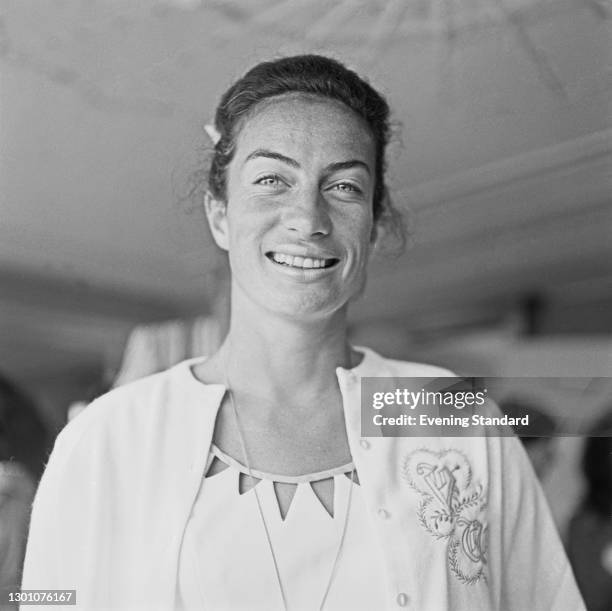 British tennis player Virginia Wade during the 1973 Queen's Club Championships in London, UK, 23rd June 1973. She is wearing a tennis dress with a...