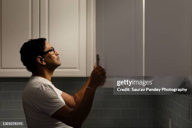 cabinet surprise - schrank stock-fotos und bilder