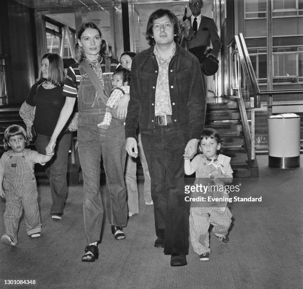 American actress Mia Farrow with her husband, conductor and composer André Previn and their children at Heathrow Airport in London, UK, en route to...