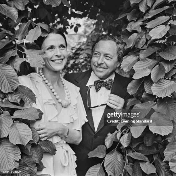 English actress Claire Bloom with US playwright Tennessee Williams in Savoy Gardens, London, UK, 26th June 1973. She is starring as Blanche DuBois in...