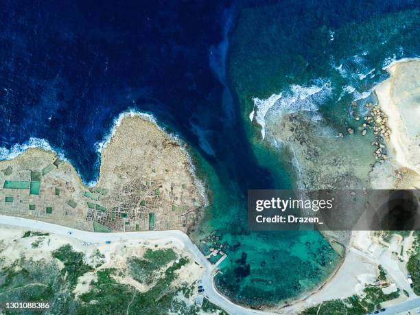 malta - mediterranean travel destination - san lawrenz in gozo island, azure window ruins - azure window malta stock pictures, royalty-free photos & images