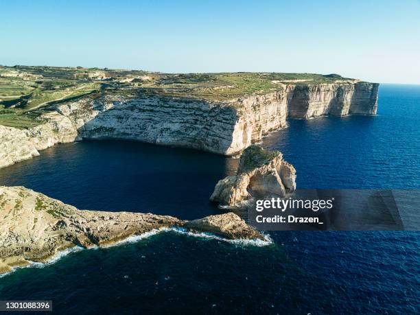 malta - mediterranean travel destination - san lawrenz in gozo island, azure window ruins - dwejra imagens e fotografias de stock