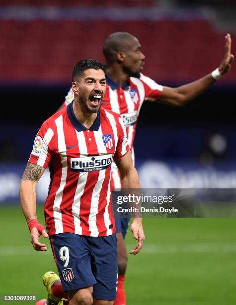 Luis Suarez of Atletico de Madrid celebrates after scoring their team's second goal during the La Liga Santander match between Atletico de Madrid and...