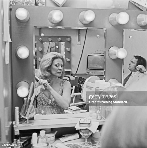 292 Woman Brushing Hair In Mirror Photos and Premium High Res Pictures -  Getty Images