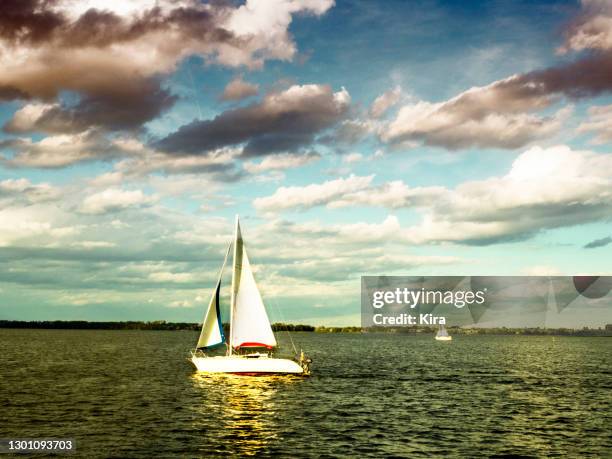 boat sailing on lake niegocin, gizycko, poland - gizycko stock pictures, royalty-free photos & images