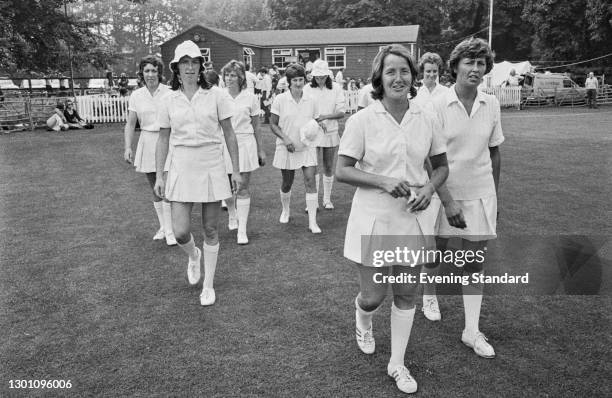 Team captain Rachael Heyhoe Flint leads the England women's cricket team out, UK, 20th August 1973. Audrey Disbury is on the right, with Heather...