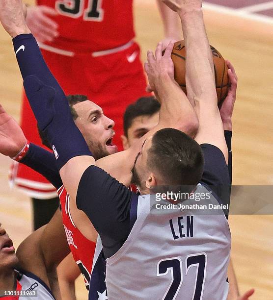 Zach LaVine of the Chicago Bulls is fouled by Alex Len of the Washington Wizards at the United Center on February 08, 2021 in Chicago, Illinois. NOTE...