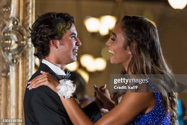 teenage couple dressed for prom, slow dancing - prom dancing stock pictures, royalty-free photos & images