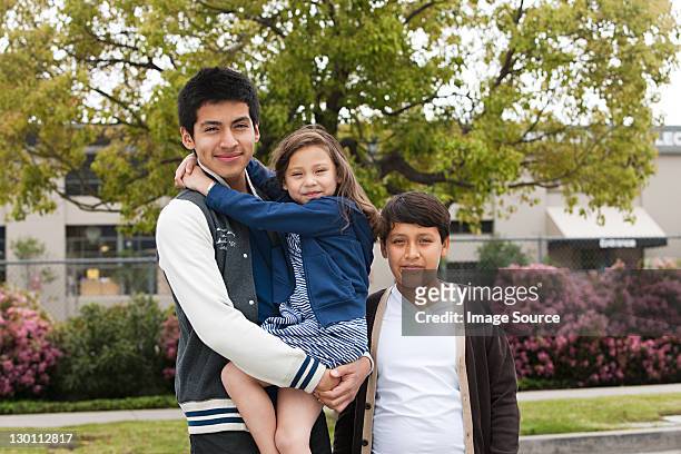 three siblings, portrait - sibling stock pictures, royalty-free photos & images
