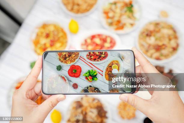 taking picture of food table. - auckland food bildbanksfoton och bilder