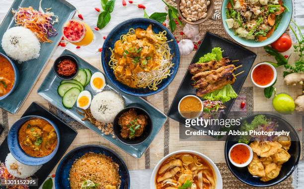 healthy malaysian food table. - traditional malay food stock pictures, royalty-free photos & images