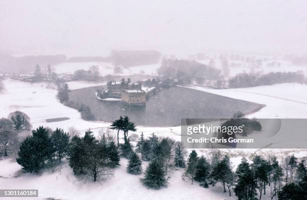 An aerial view of Leeds Castle covered in snow on February 7,2021 in Maidstone, England. Heavy snow in Scotland and South East England over this...