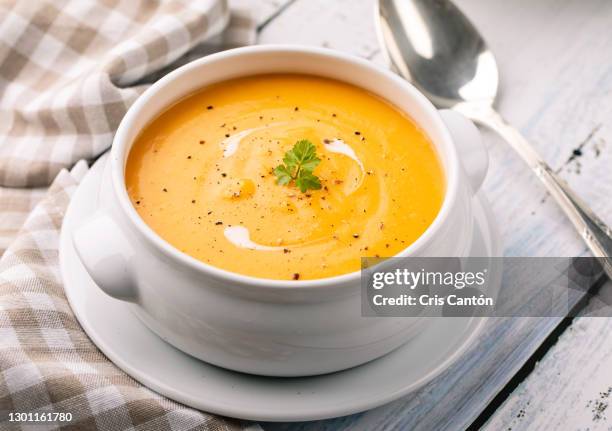 carrot soup with cream and croutons - pureed stock pictures, royalty-free photos & images