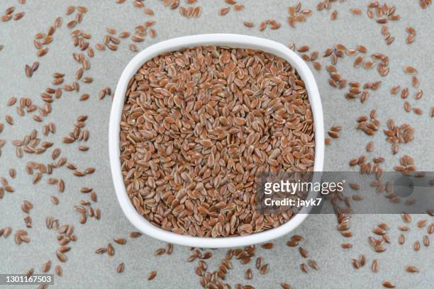 flax seeds - food jayk7 stock pictures, royalty-free photos & images