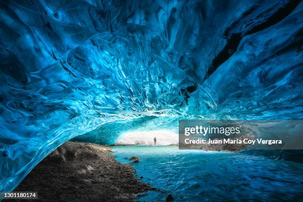 deep into sapphire blue ice - vatnajökull national park (iceland) - iceland stockfoto's en -beelden