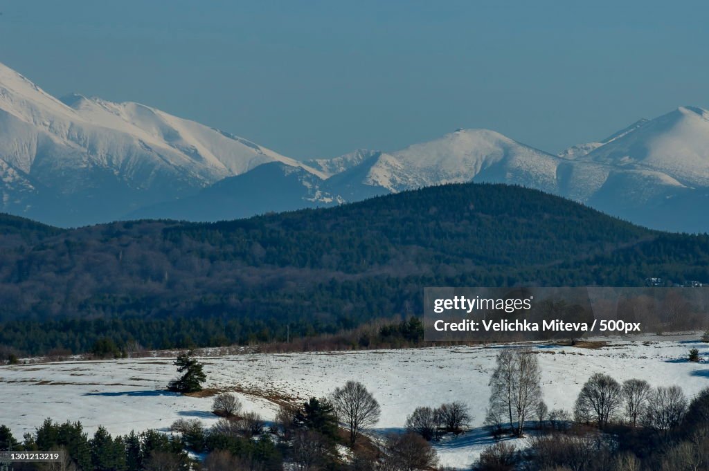 Scenic view of snowcapped mountains against sky,Rila,Bulgaria