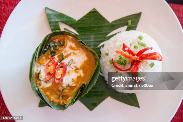 high angle view of meal served in plate on table - cambodia food stock pictures, royalty-free photos & images