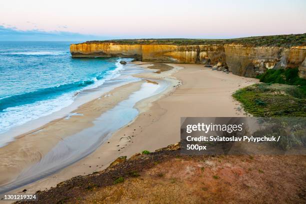 scenic view of beach against sky,great ocean rd,anglesea,victoria,australia - anglesea bildbanksfoton och bilder