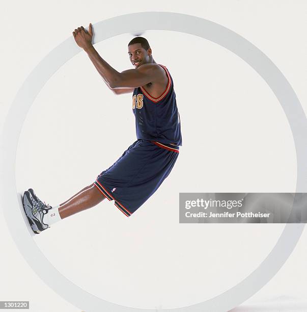 Nene Hilario of the Denver Nuggets poses for a portrait during the 2002 NBA Rookie Shoot on August 3, 2002 at St. Peter's Prep School in Jersey City,...