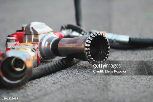 close-up impact wrench ready for pit stop moment - circuit de catalunya imagens e fotografias de stock
