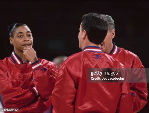 Official Referee Violet Palmer keeps an eye on the action while in conversation with other game officials during the NBA Pacific Division basketball...