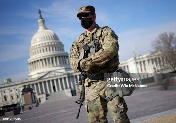 National Guard troops stand guard before the start of the second impeachment trial of former U.S. President Donald Trump February 9, 2021 in...
