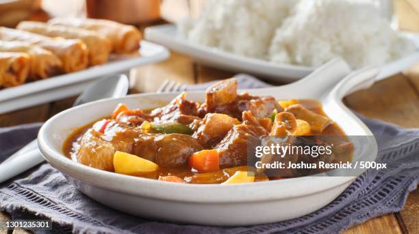 filipino beef kaldereta in bowl - beef stew stock pictures, royalty-free photos & images