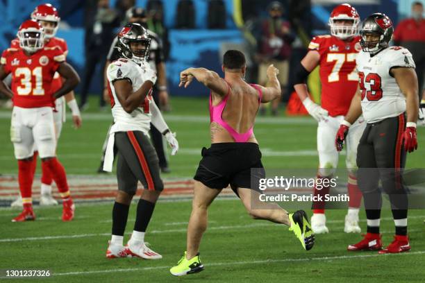 Yuri Andrade trespasses on the field during the fourth quarter in Super Bowl LV between the Tampa Bay Buccaneers and the Kansas City Chiefs at...