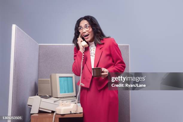 retro office worker on phone at computer cubicle - old fashioned telephone stock pictures, royalty-free photos & images