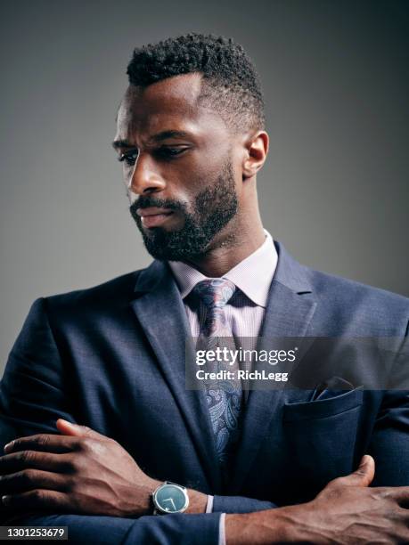 studio portrait of a man in a suit - male model stock pictures, royalty-free photos & images