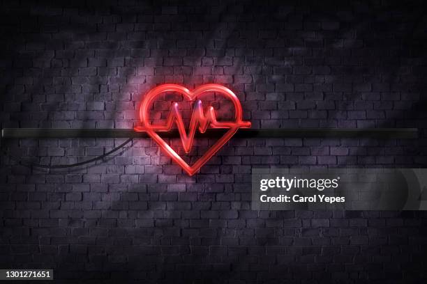 red heart and ekg en neon style - listening to heartbeat stockfoto's en -beelden